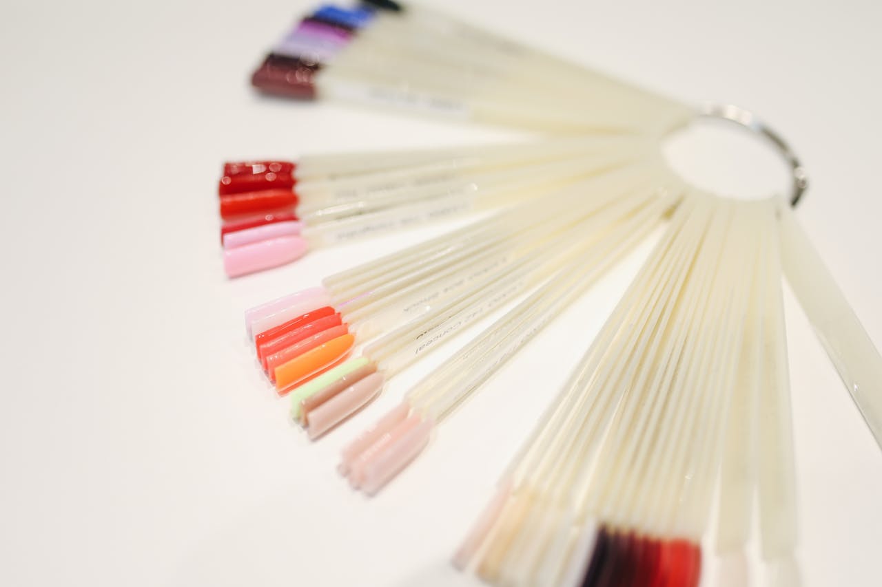 A variety of nail polish samples on display, showcasing vibrant colors for manicure selection.